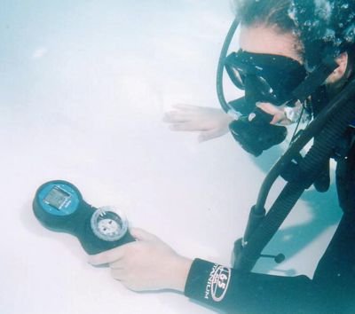 Diver checking compass