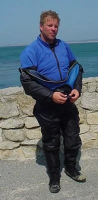 Diver in open drysuit showing thermals