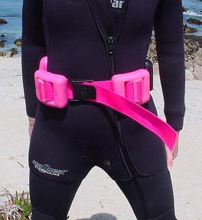 Diver wearing hard weights