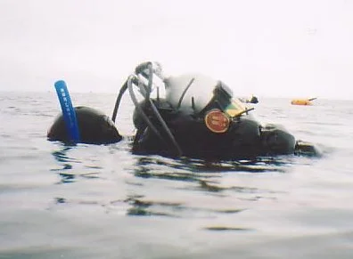 Diver on surface breathing from snorkel